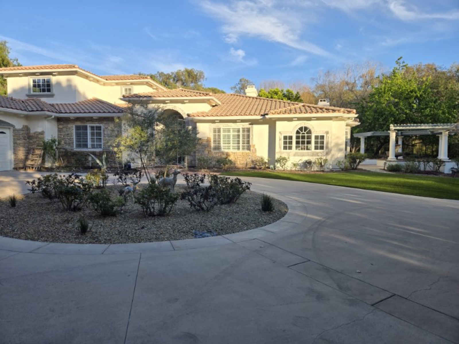Iniguez Landscaping estate property with circular drive and manicured grounds